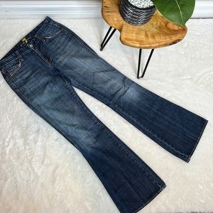 Seven for All Mankind boot cut, mid rise jeans, size 27.